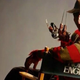 Robert Englund sits in a director's chair with his name on it, dressed in full Freddy Krueger make-up and costume.